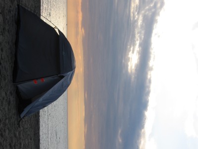 This is a charming (sideways) view of our tent in front of a sunset on Lake Erie. I believe this is before the nighttime thunderstorm that sent everyone else packing into their cars. But Rhiannon had no car, so she persevered. At least this is how she tells it.
